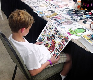 Boy Reading Gangbuster comic book at Florida Supercon in 2010